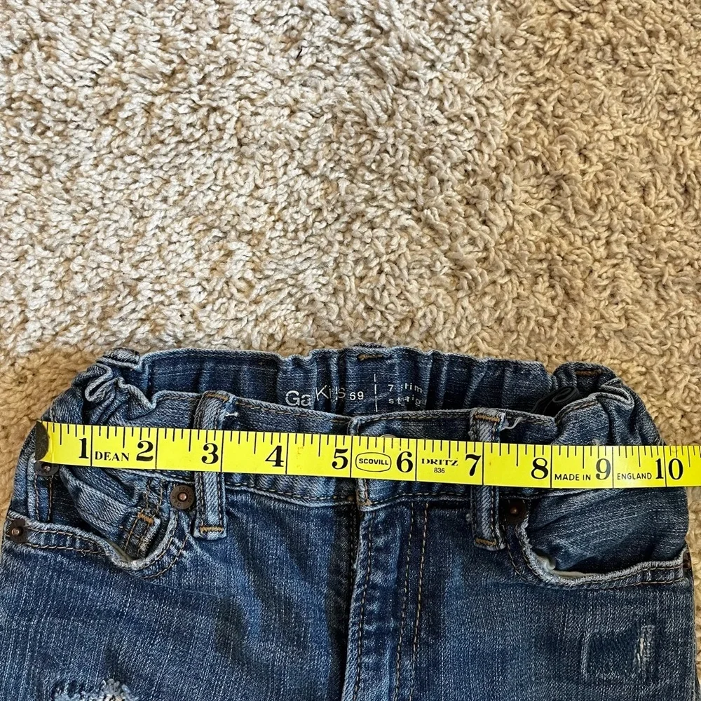 Gap 1969 size 7 slim jeans with distressed finish. Adjustable waist great cond